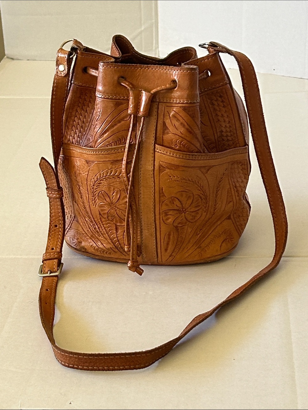Handcrafted Floral Tooled Leather Drawstring Crossbody Bag - Tan